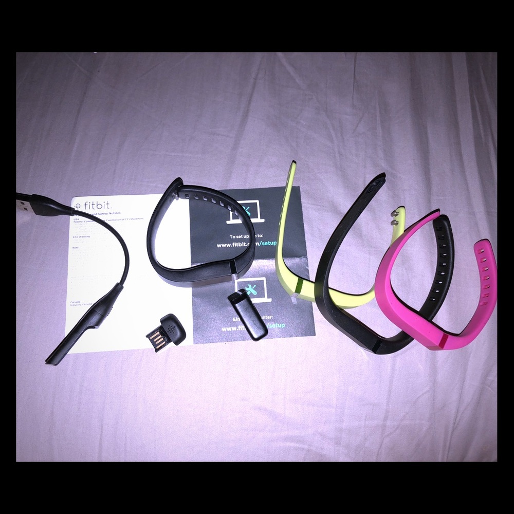 Fitbit with 4 changeable bands, used 1 black only